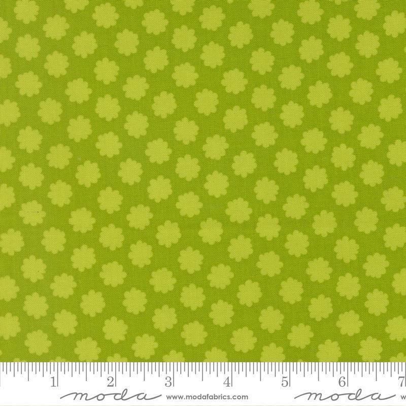 Image of Scenery Puffball Lime quilting cotton fabric by Elizabeth Hartman for Moda Fabrics. Features a geometric pattern on a green background. Cute Little Fabric Shop.