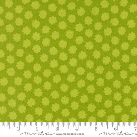 Image of Scenery Puffball Lime quilting cotton fabric by Elizabeth Hartman for Moda Fabrics. Features a geometric pattern on a green background. Cute Little Fabric Shop.
