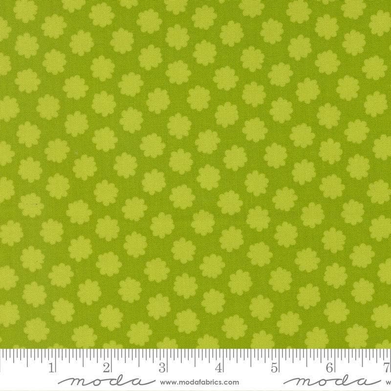 Image of Scenery Puffball Lime quilting cotton fabric by Elizabeth Hartman for Moda Fabrics. Features a geometric pattern on a green background. Cute Little Fabric Shop.