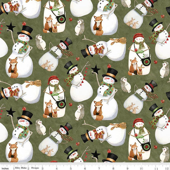 Image of Northern Christmas Snowmen Green quilting cotton fabric by Teresa Kogut for Riley Blake Designs. Features snowmen on a green background. Cute Little Fabric Shop.