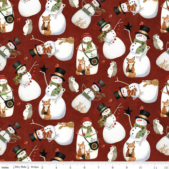 Image of Northern Christmas Snowmen Red quilting cotton fabric by Teresa Kogut for Riley Blake Designs. Features snowmen on a red background. Cute Little Fabric Shop.