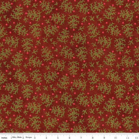 Image of Northern Christmas Whimsical Trees Red quilting cotton fabric by Teresa Kogut for Riley Blake Designs. Features leaves on a red background. Cute Little Fabric Shop.