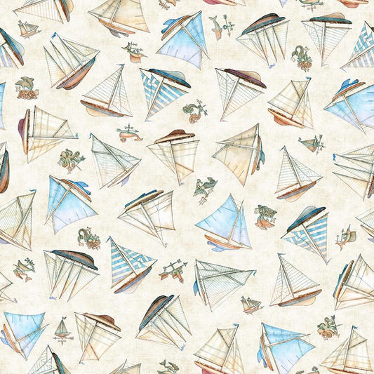 Image of Nauticus Ship Toss Cream quilting cotton fabric by Morris Creative Group for QT Fabrics. Features boats on a cream background. Cute Little Fabric Shop.