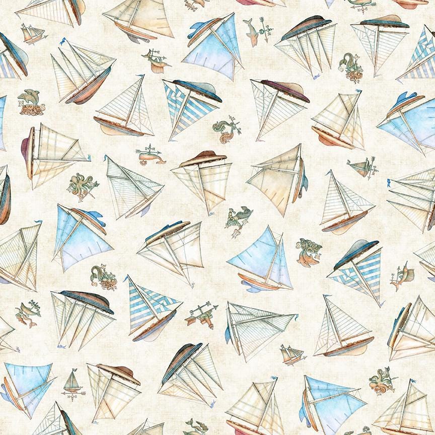 Image of Nauticus Ship Toss Cream quilting cotton fabric by Morris Creative Group for QT Fabrics. Features boats on a cream background. Cute Little Fabric Shop.