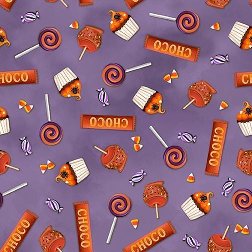 Image of Ghost Tales Halloween Candy Light Purple quilting cotton fabric by Michael Zindell for QT Fabrics. Features candy on a purple background. Cute Little Fabric Shop.