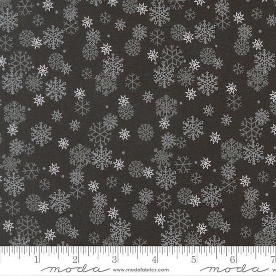 Image of Holiday Cheer Snowflake Midnight quilting cotton fabric by Stacy Iest Hsu for Moda Fabrics. Features snowflake on a black background. Cute Little Fabric Shop.