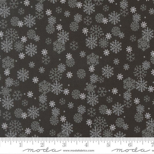Image of Holiday Cheer Snowflake Midnight quilting cotton fabric by Stacy Iest Hsu for Moda Fabrics. Features snowflake on a black background. Cute Little Fabric Shop.