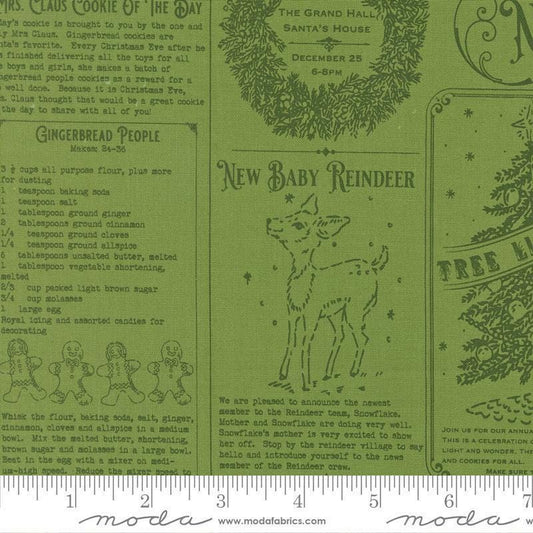 Image of Holiday Cheer North Pole News Mistletoe quilting cotton fabric by Stacy Iest Hsu for Moda Fabrics. Features words on a green background. Cute Little Fabric Shop.