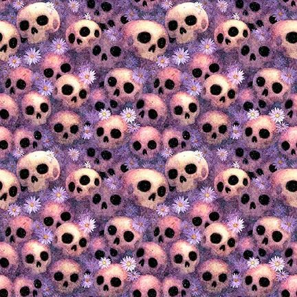 Image of Witchypoo Skulls Purple quilting cotton fabric by Morris Creative Group for QT Fabrics. Features skulls on a purple background. Cute Little Fabric Shop.