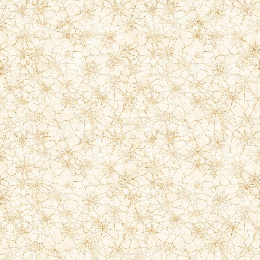 Image of Witchypoo Spiderwebs Tan quilting cotton fabric by Morris Creative Group for QT Fabrics. Features spiderwebs on a cream background. Cute Little Fabric Shop.