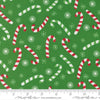 Image of Snow Time Candy Cane Evergreen quilting cotton fabric by Me and My Sister Designs for Moda Fabrics. Features candy canes on a green background. Cute Little Fabric Shop.