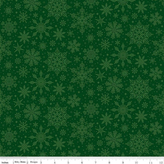 Image of Poinsettias at Christmas Snowflakes Green quilting cotton fabric by Jennifer Bosworth for Riley Blake Designs. Features snowflakes on a green background. Cute Little Fabric Shop.
