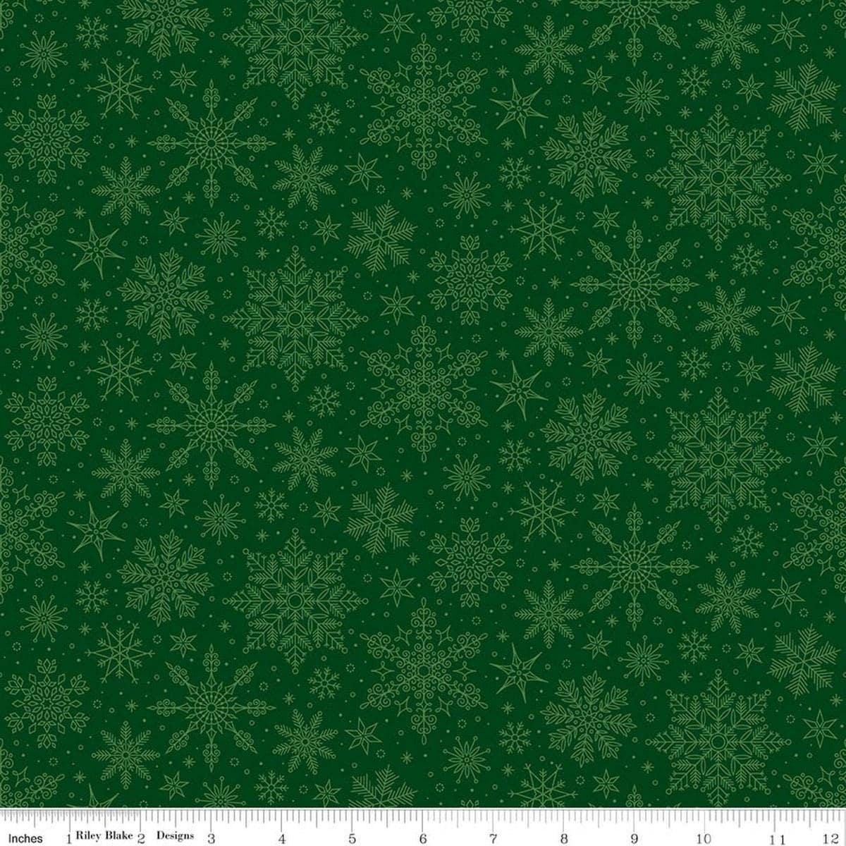 Image of Poinsettias at Christmas Snowflakes Green quilting cotton fabric by Jennifer Bosworth for Riley Blake Designs. Features snowflakes on a green background. Cute Little Fabric Shop.