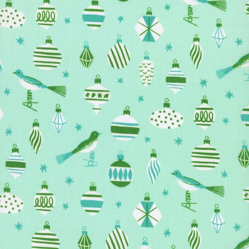 Image of Merry Happy Baubles Mint quilting cotton fabric by Kimberly Kight of Ruby Star Society for Moda Fabrics. Features ornaments on a green background. Cute Little Fabric Shop.