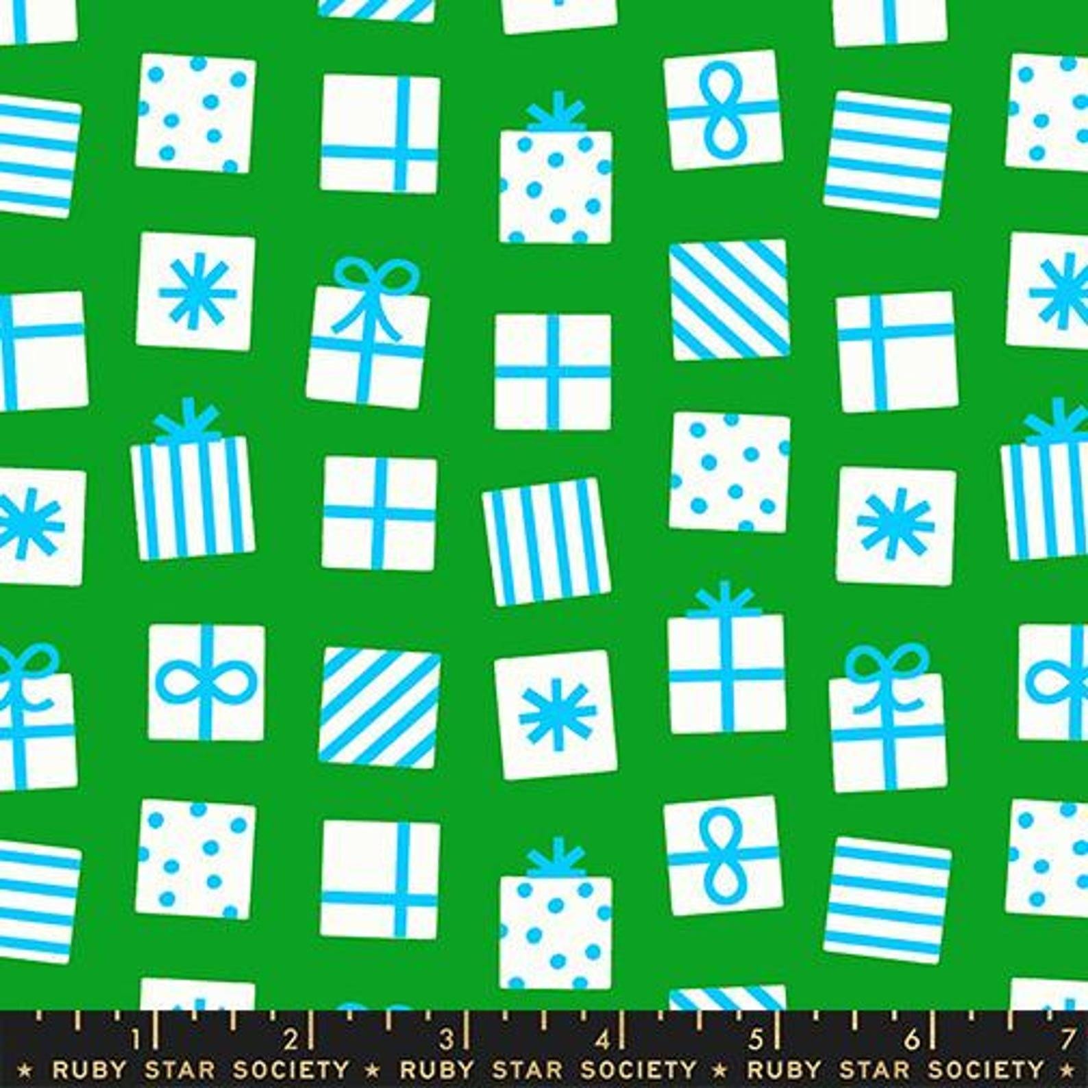 Image of Merry Happy Secret Santa Verdant quilting cotton fabric by Kimberly Kight of Ruby Star Society for Moda Fabrics. Features gifts on a green background. Cute Little Fabric Shop.