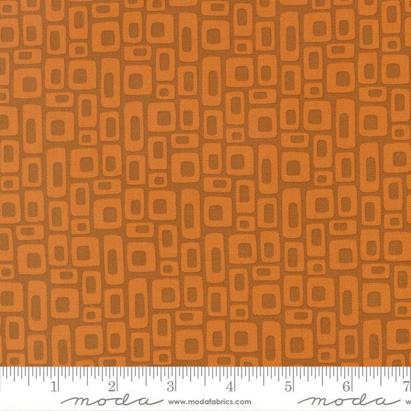 Image of Scenery Marshmallow Rusty quilting cotton fabric by Elizabeth Hartman for Moda Fabrics. Features a geometric pattern on a brown background. Cute Little Fabric Shop.