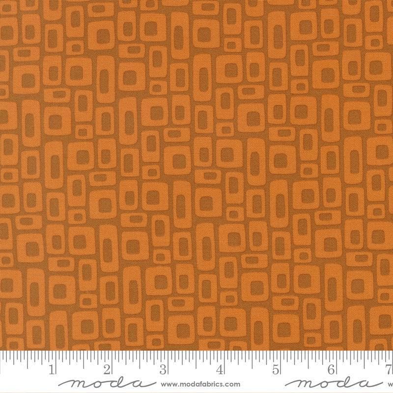 Image of Scenery Marshmallow Rusty quilting cotton fabric by Elizabeth Hartman for Moda Fabrics. Features a geometric pattern on a brown background. Cute Little Fabric Shop.