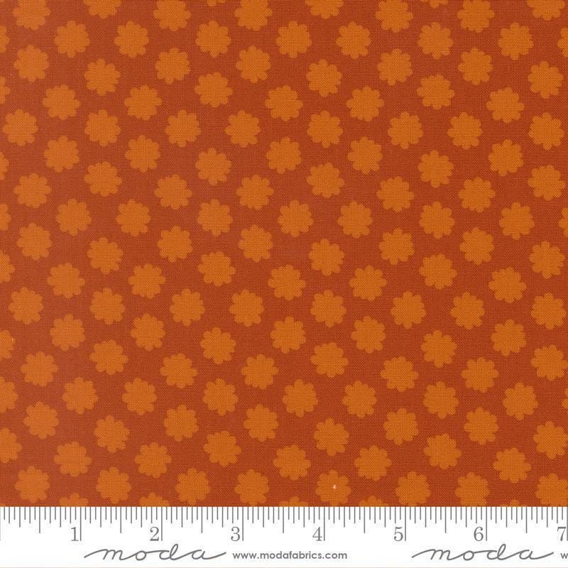 Image of Scenery Puffball Spice quilting cotton fabric by Elizabeth Hartman for Moda Fabrics. Features a geometric pattern on an orange background. Cute Little Fabric Shop.