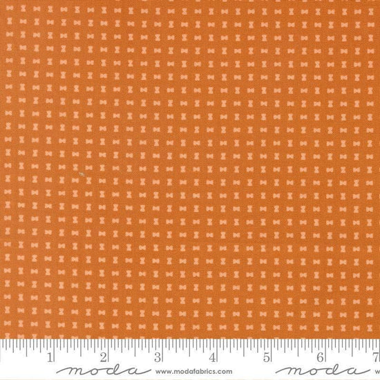 Image of Scenery Spool Pumpkin quilting cotton fabric by Elizabeth Hartman for Moda Fabrics. Features a geometric pattern on an orange background. Cute Little Fabric Shop.