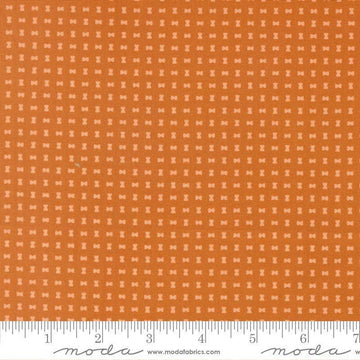 Image of Scenery Spool Pumpkin quilting cotton fabric by Elizabeth Hartman for Moda Fabrics. Features a geometric pattern on an orange background. Cute Little Fabric Shop.
