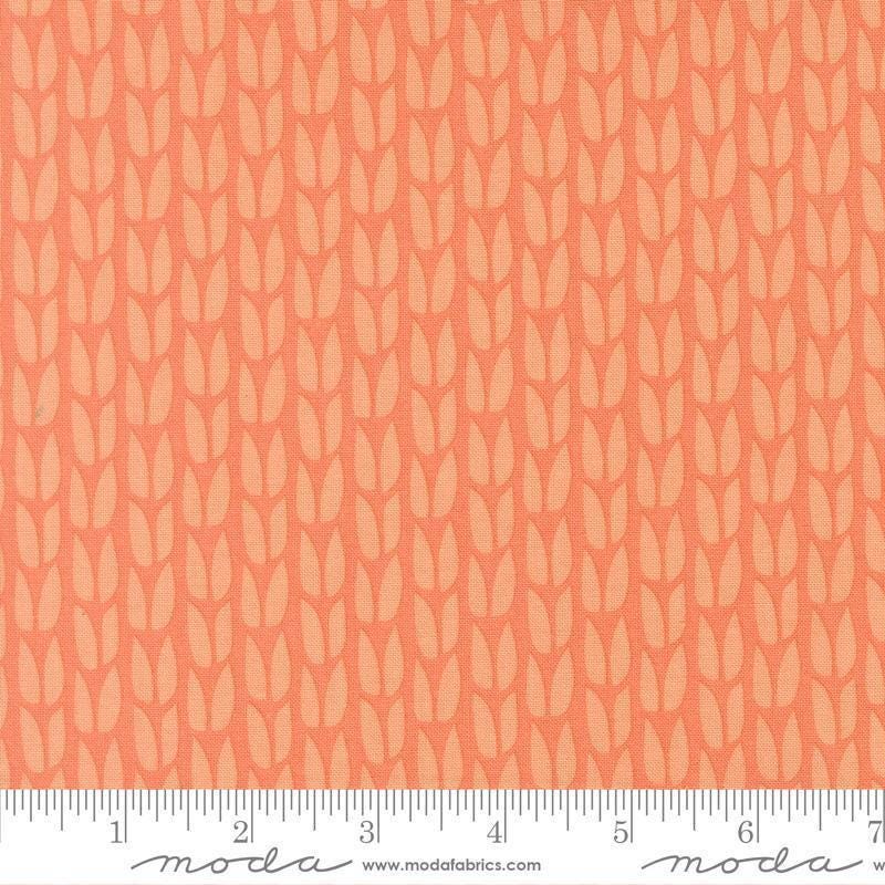 Image of Scenery Sprout Coral quilting cotton fabric by Elizabeth Hartman for Moda Fabrics. Features leaves on an orange background. Cute Little Fabric Shop.
