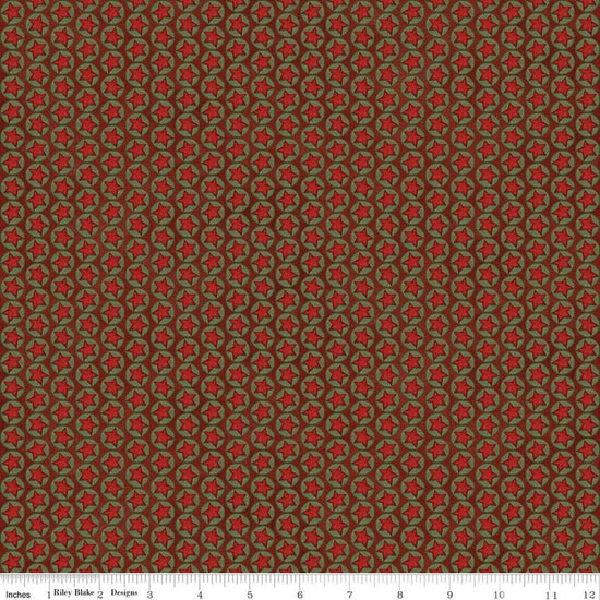 Image of Northern Christmas Stars Red quilting cotton fabric by Teresa Kogut for Riley Blake Designs. Features stars on a red background. Cute Little Fabric Shop.