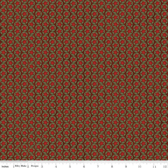Image of Northern Christmas Stars Red quilting cotton fabric by Teresa Kogut for Riley Blake Designs. Features stars on a red background. Cute Little Fabric Shop.