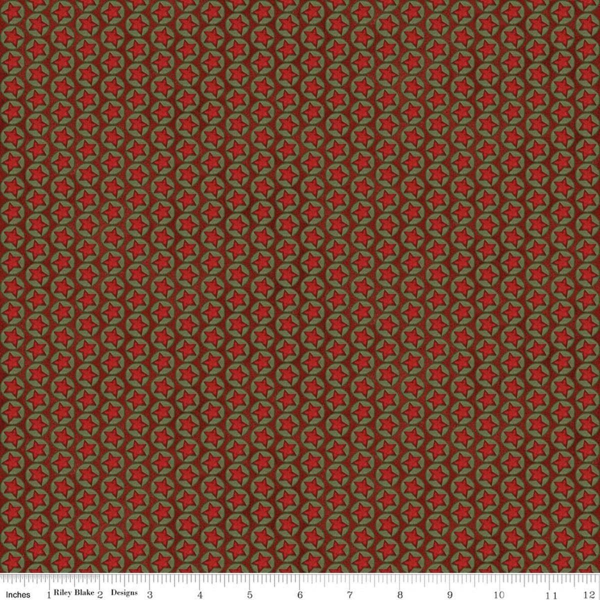 Image of Northern Christmas Stars Red quilting cotton fabric by Teresa Kogut for Riley Blake Designs. Features stars on a red background. Cute Little Fabric Shop.