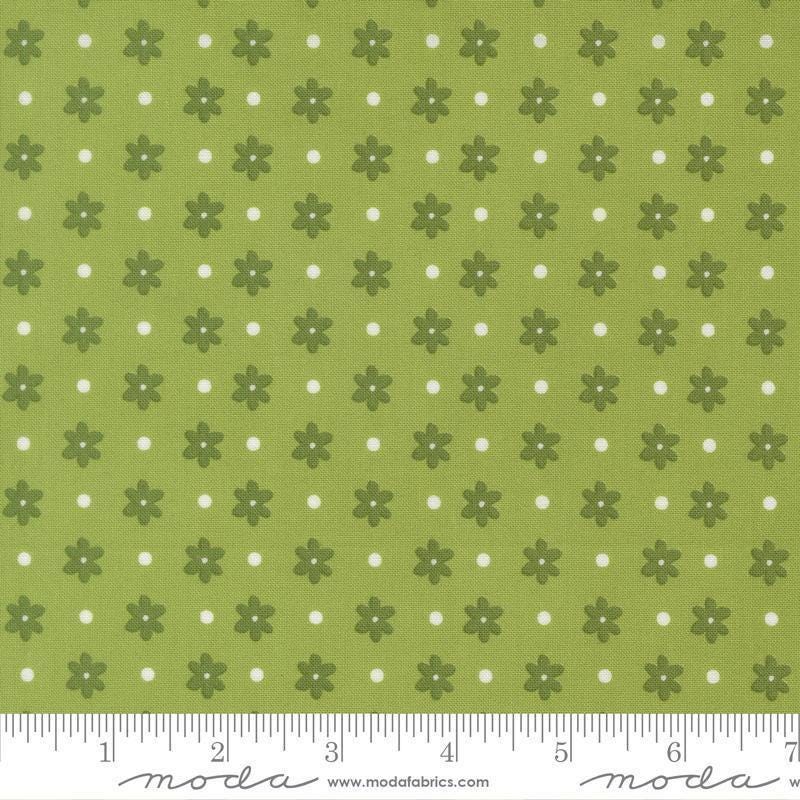 Image of Poinsettia and Pear Daisy Dot Fresh Grass quilting cotton fabric by Sherri & Chelsi for Moda Fabrics. Features flowers on a green background. Cute Little Fabric Shop.