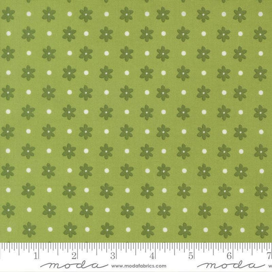 Image of Poinsettia and Pear Daisy Dot Fresh Grass quilting cotton fabric by Sherri & Chelsi for Moda Fabrics. Features flowers on a green background. Cute Little Fabric Shop.