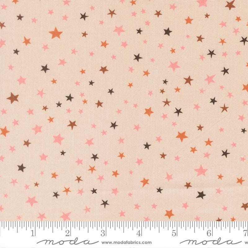 Image of Purrs and Boos Stars Moonbeam quilting cotton fabric by Elena Amo for Moda Fabrics. Features stars on a cream background. Cute Little Fabric Shop.