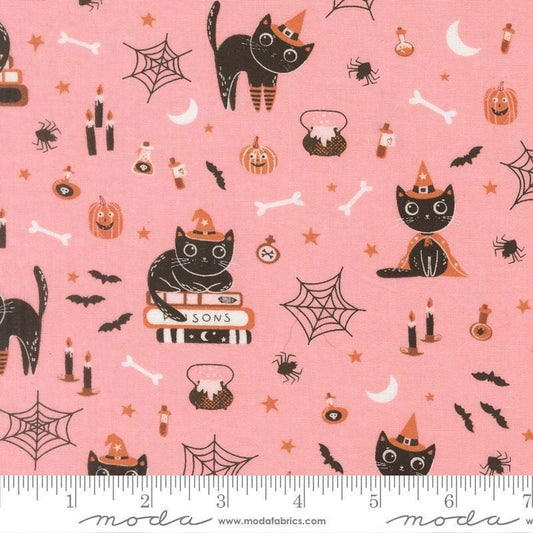 Image of Purrs and Boos Cats Candy quilting cotton fabric by Elena Amo for Moda Fabrics. Features cats and halloween icons on a pink background. Cute Little Fabric Shop.