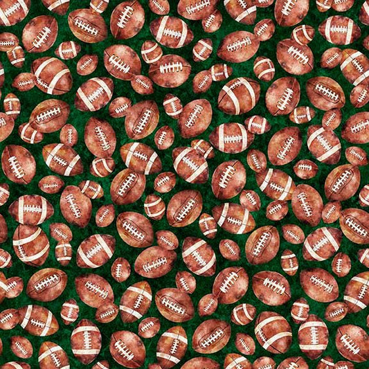 Image of Gridiron Gang Footballs Forest quilting cotton fabric by Morris Creative Group for QT Fabrics. Features football gear on a green background. Cute Little Fabric Shop.
