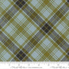 Image of Chilly Plaid Storm quilting cotton fabric by Sweetwater for Moda Fabrics. Features plaid on a blue and green background. Cute Little Fabric Shop.