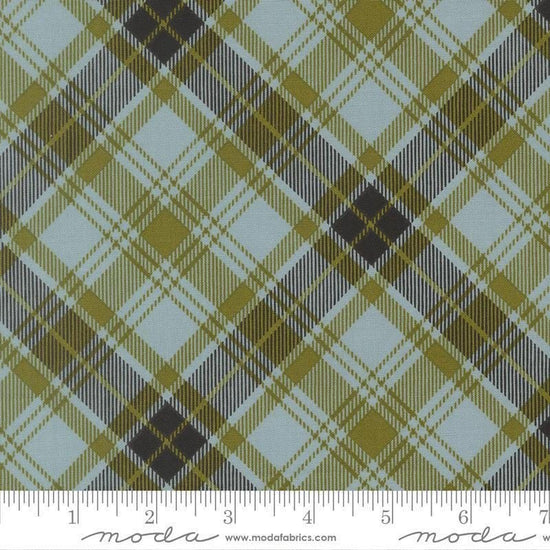 Image of Chilly Plaid Storm quilting cotton fabric by Sweetwater for Moda Fabrics. Features plaid on a blue and green background. Cute Little Fabric Shop.