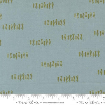 Image of Chilly The Forest Storm quilting cotton fabric by Sweetwater for Moda Fabrics. Features trees on a blue background. Cute Little Fabric Shop.
