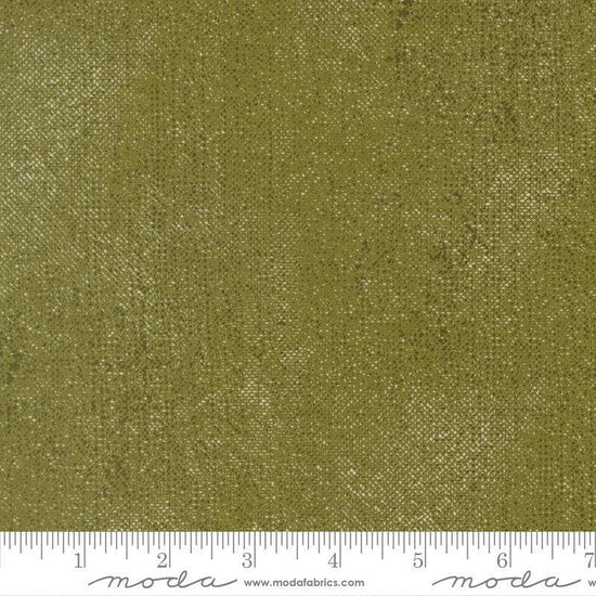 Image of Chilly White Out Pine quilting cotton fabric by Sweetwater for Moda Fabrics. Features printed texture on a green background. Cute Little Fabric Shop.