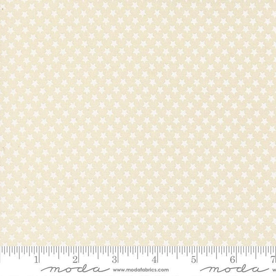 Image of Chilly Star Bright Vanilla White quilting cotton fabric by Sweetwater for Moda Fabrics. Features stars on a cream background. Cute Little Fabric Shop.