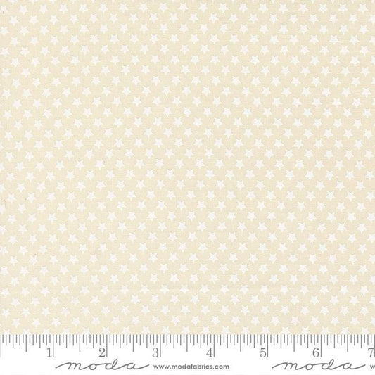 Image of Chilly Star Bright Vanilla White quilting cotton fabric by Sweetwater for Moda Fabrics. Features stars on a cream background. Cute Little Fabric Shop.