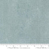 Image of Chilly White Out Storm quilting cotton fabric by Sweetwater for Moda Fabrics. Features printed texture on a blue background. Cute Little Fabric Shop.