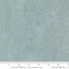 Image of Chilly White Out Storm quilting cotton fabric by Sweetwater for Moda Fabrics. Features printed texture on a blue background. Cute Little Fabric Shop.