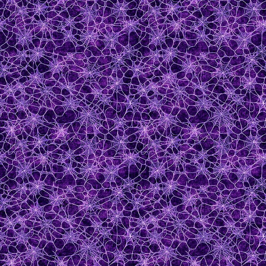 Image of Witchypoo Spiderwebs Purple quilting cotton fabric by Morris Creative Group for QT Fabrics. Features spiderwebs on a purple background. Cute Little Fabric Shop.