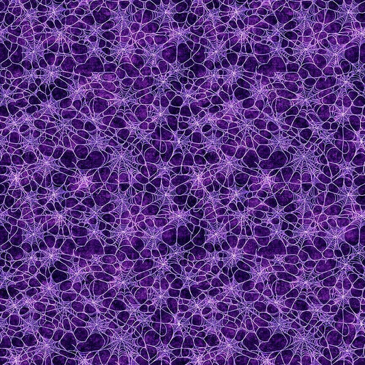 Image of Witchypoo Spiderwebs Purple quilting cotton fabric by Morris Creative Group for QT Fabrics. Features spiderwebs on a purple background. Cute Little Fabric Shop.