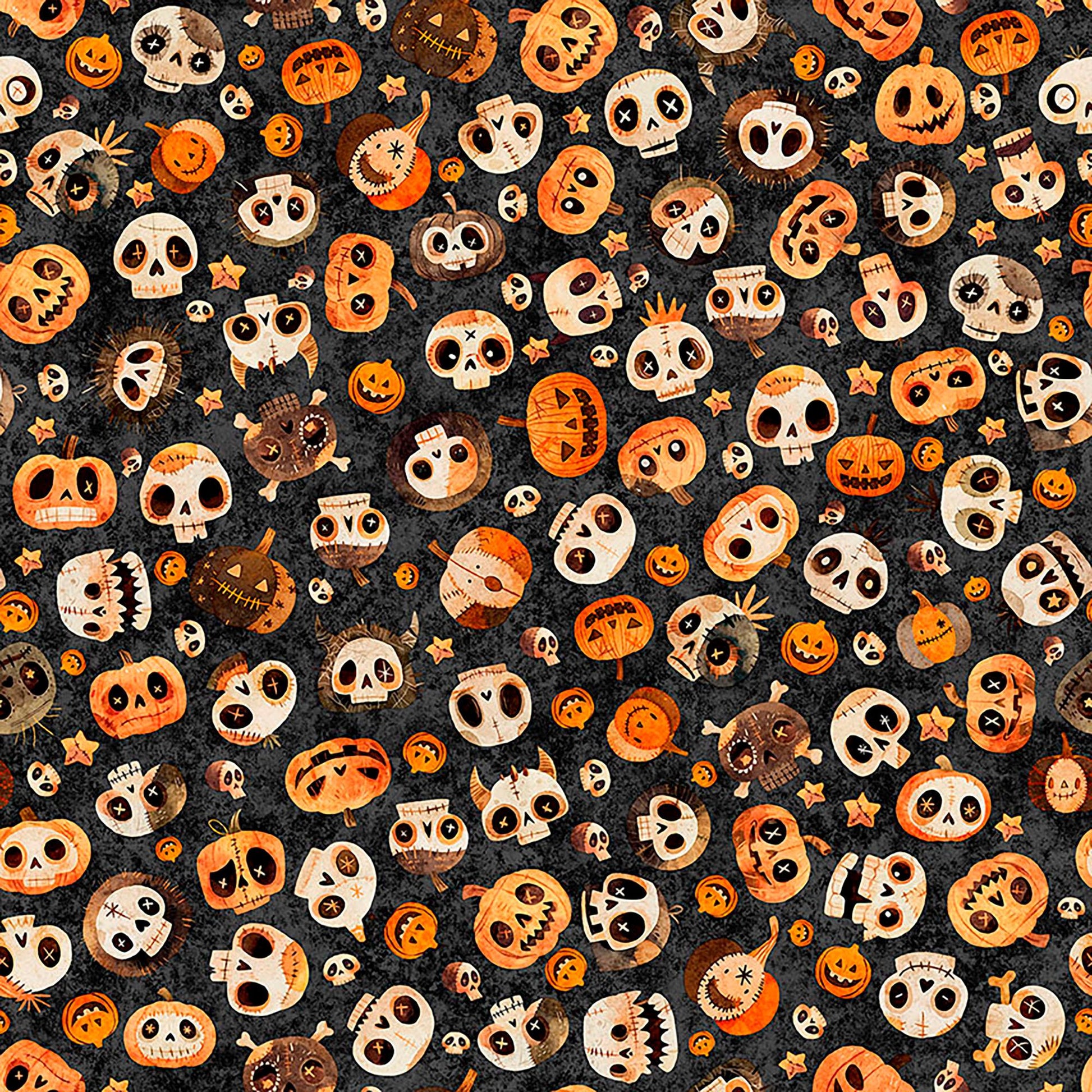 Image of A Haunting We Will Go Skulls & Pumpkin Toss Charcoal quilting cotton fabric by Morris Creative Group for QT Fabrics. Features pumpkins and skulls on a black background. Cute Little Fabric Shop.