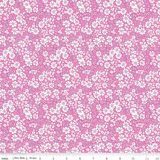 Image of Chasing Rainbows Everbloom Pink quilting cotton fabric by Leslie Ryan for Riley Blake Designs. Features flowers on a pink background. Cute Little Fabric Shop.