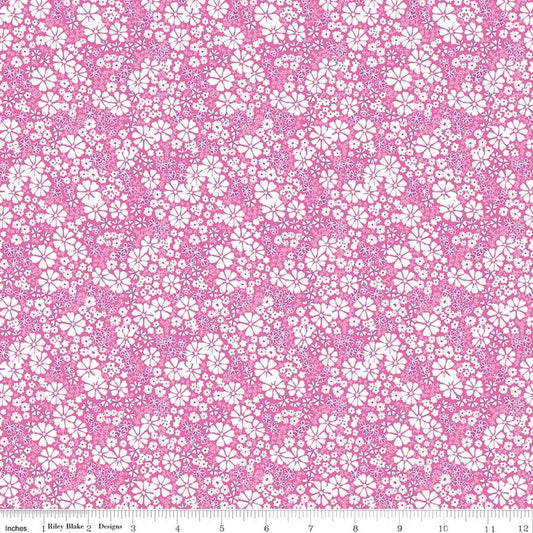 Image of Chasing Rainbows Everbloom Pink quilting cotton fabric by Leslie Ryan for Riley Blake Designs. Features flowers on a pink background. Cute Little Fabric Shop.
