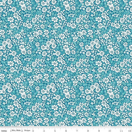 Image of Chasing Rainbows Everbloom Paradise quilting cotton fabric by Leslie Ryan for Riley Blake Designs. Features flowers on a blue background. Cute Little Fabric Shop.