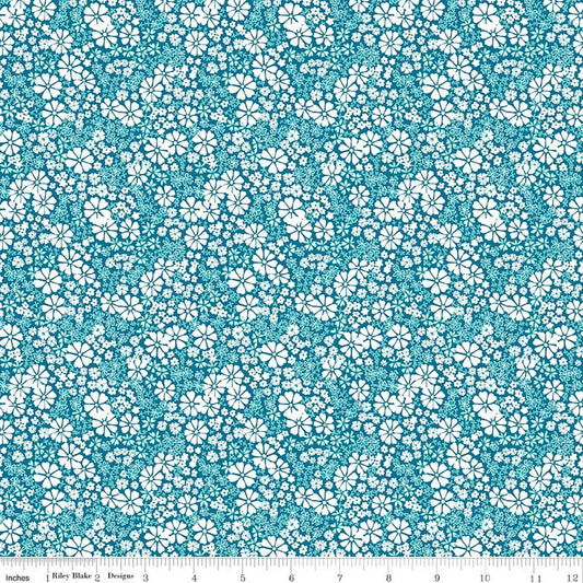 Image of Chasing Rainbows Everbloom Paradise quilting cotton fabric by Leslie Ryan for Riley Blake Designs. Features flowers on a blue background. Cute Little Fabric Shop.