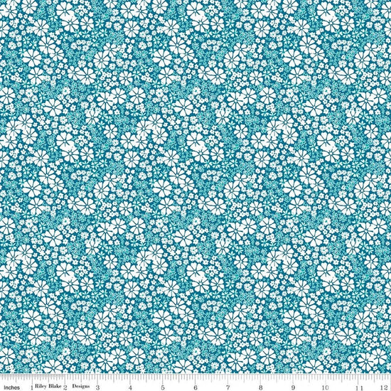 Image of Chasing Rainbows Everbloom Paradise quilting cotton fabric by Leslie Ryan for Riley Blake Designs. Features flowers on a blue background. Cute Little Fabric Shop.