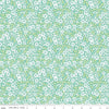 Image of Chasing Rainbows Everbloom Leaf quilting cotton fabric by Leslie Ryan for Riley Blake Designs. Features flowers on a green and blue background. Cute Little Fabric Shop.